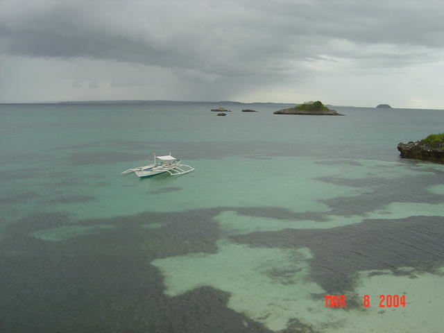 Banca & Rain, Malapascua, Philippines