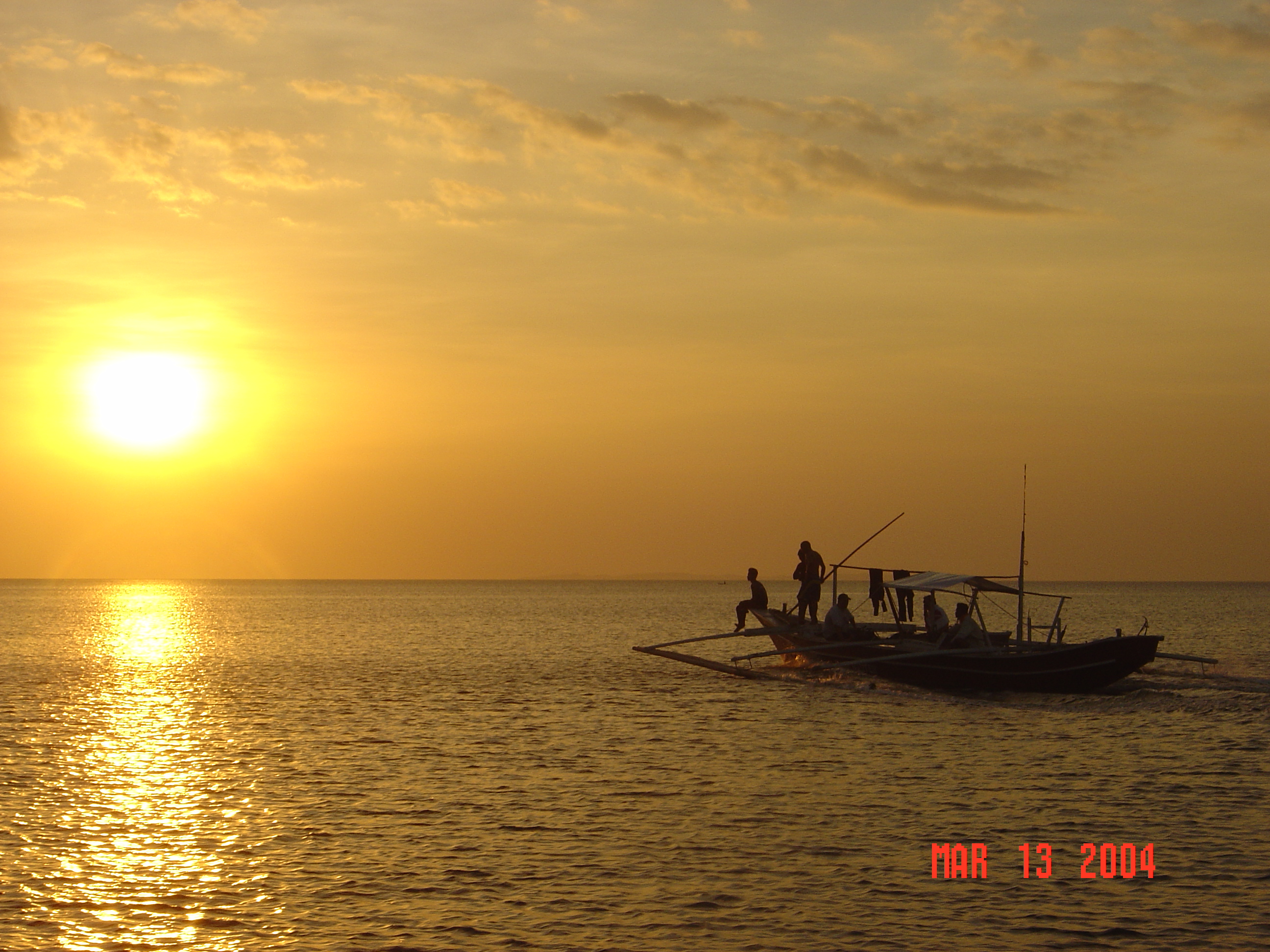 Banca & Sunset, Anilao, Philippines