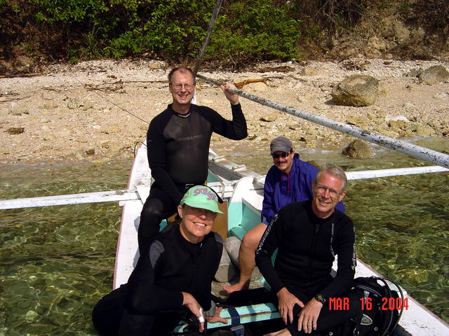 Margie, Peter, Dan, Jim, 
near Puerto Galera Lighthouse, Mindoro, Philippines.