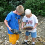 Cousins Isaac and Jstin panning for gold (really)