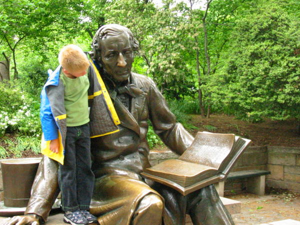 Hans Christian Andersen shares a story with Sir Isaac