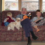 Grandpa reads a scary story to Justin and Isaac