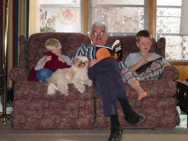 Grandpa reads a scary story to Justin and Isaac