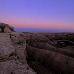 Sunrise Glow.  Alpin glow on the horizon.  Canyon de Chelley.  F100, 17-35mm, Velvia