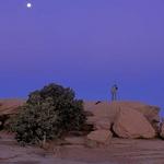 Photographer at Sunrise.  Canyon de Chelley.  Full Moon setting.  F100, 17-35mm.