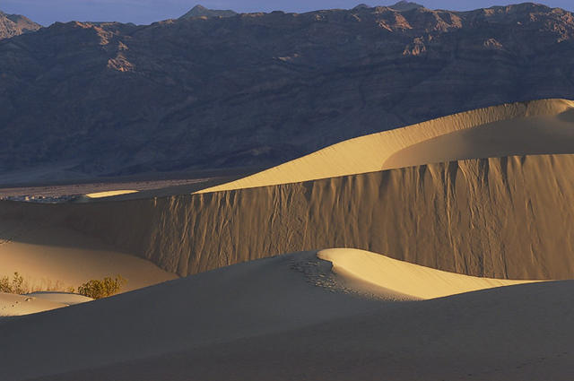 34  Dunes set against the mountain.  Light and shade