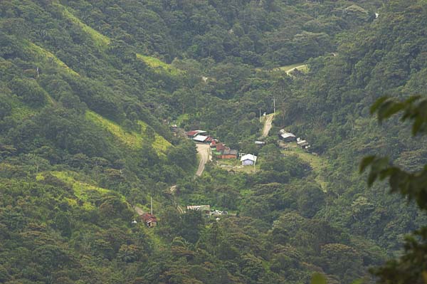 61  Village in the valley.  Not much going on since the new highway has bypassed them.  The road to the right leads to one of ma