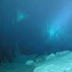 a Dark floor to Stalactites