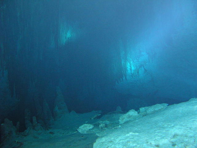 a Dark floor to Stalactites