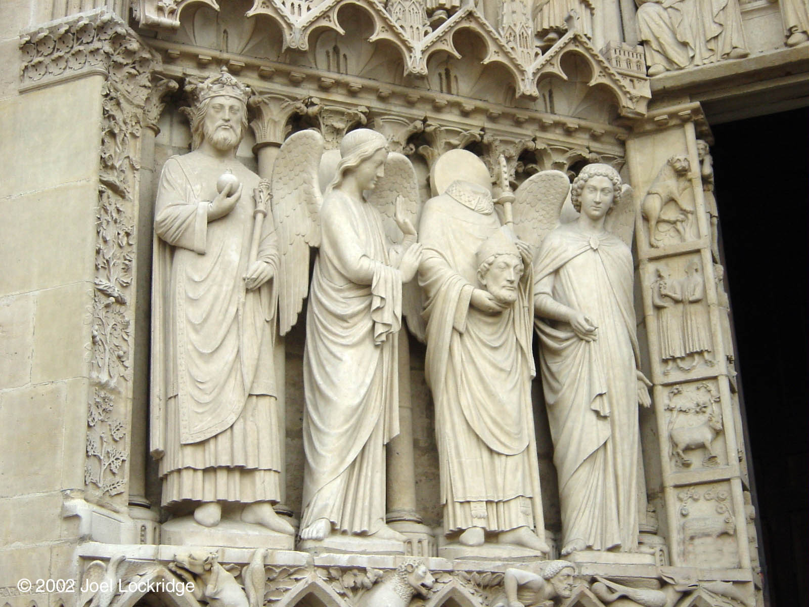 Outside of one of the main arched doorways.  Notice the figure holding his own head.