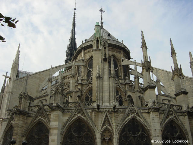 Flying buttresses of the Notre Dame from the Square Jean XXIII garden courtyard.