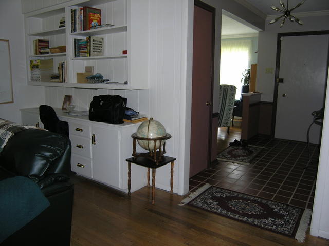 Built ins in living room 2 and hallway to front door