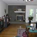 Wood burning fireplace in living area 2- french doors to the backyard