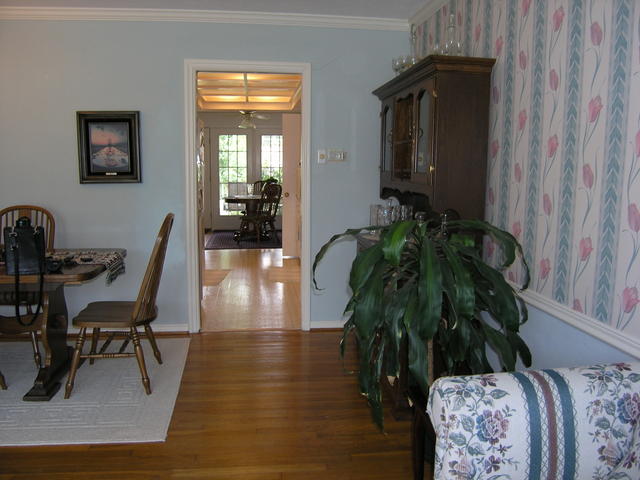 Looking from the front window- through living area 1- through kitchen- to the breakfast area- to the french doors leading outsid