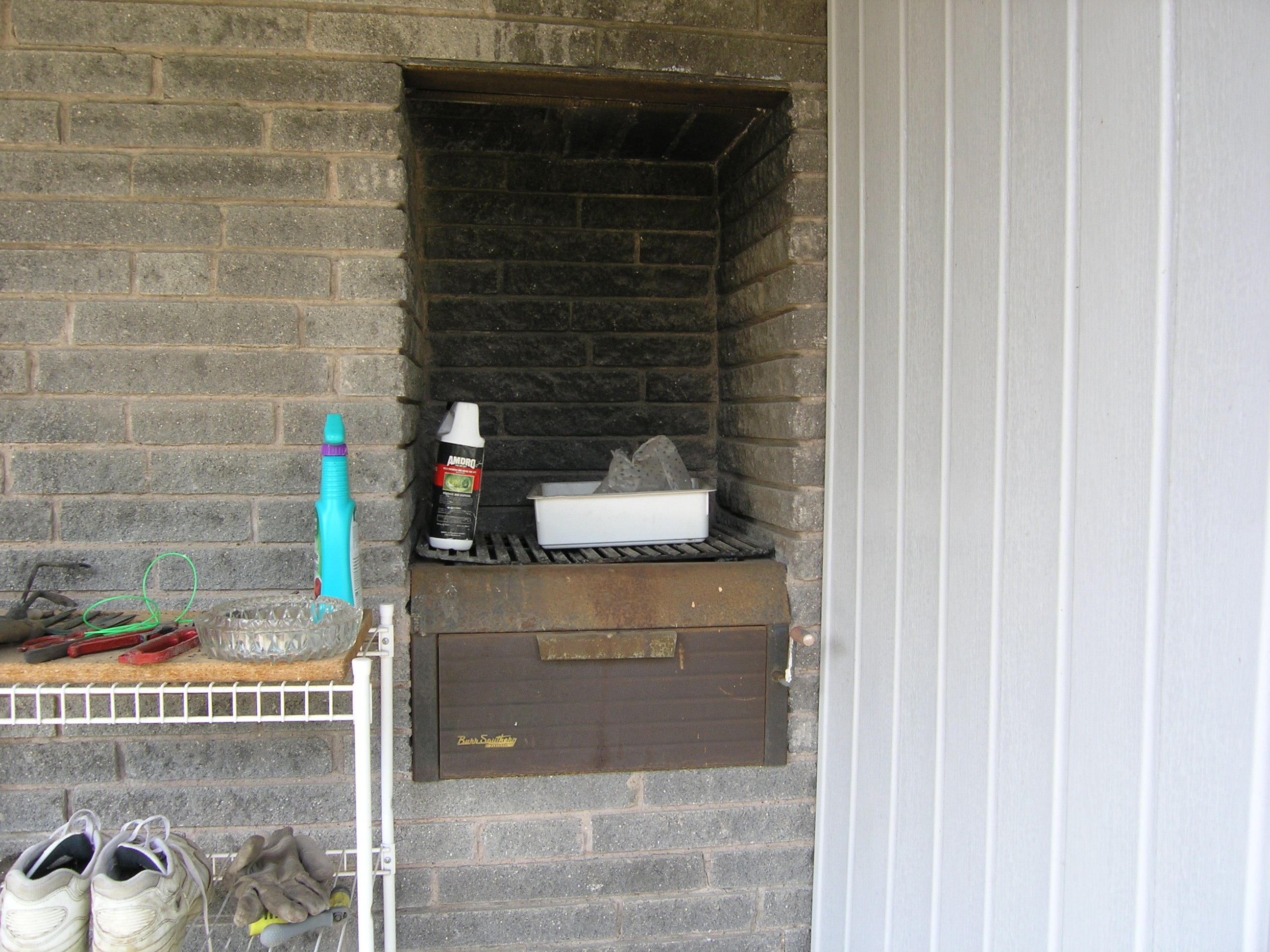 the built in grill- vents to the opposite side of the fireplace