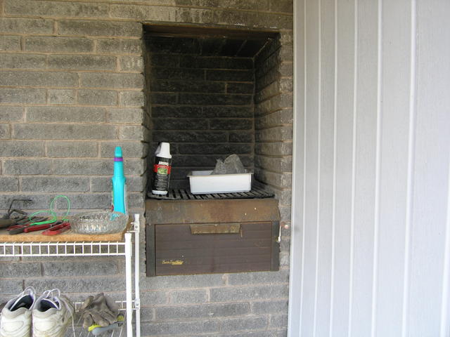 the built in grill- vents to the opposite side of the fireplace