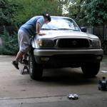 Using the factory tire tool before I went to buy a breakover bar! Much easier.