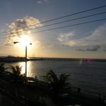 sun setting over punta lagusta pier.