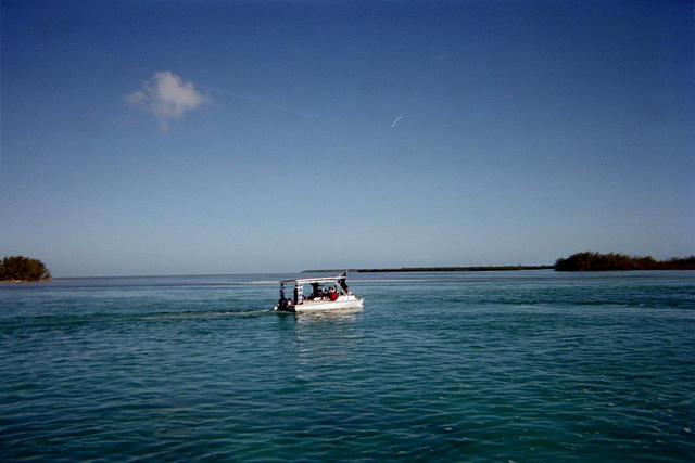 I think this is a Bahamian water taxi going from North Bimini to South Bimini.