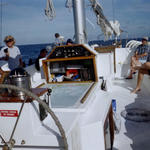 Picture of the Helm and just everybody milling around the boat.