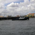 the pilot boat pulling the bridge open.