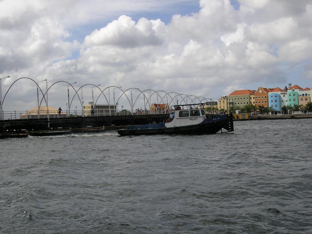 the pilot boat pulling the bridge open.