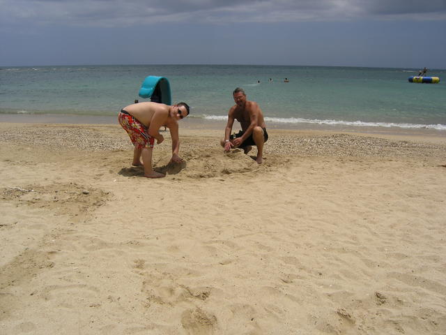 Jason & Mike building a sandcastle for the girls...