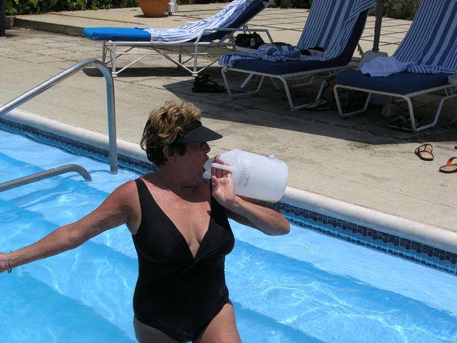 Anita finishing off the pina colada jug... we had 3 rounds- a jug and a half cost $98 each!  Who's buying the next round?