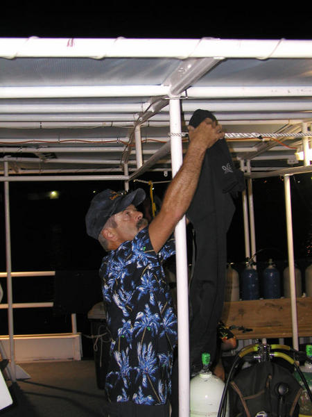 Crewman getting his gear ready.